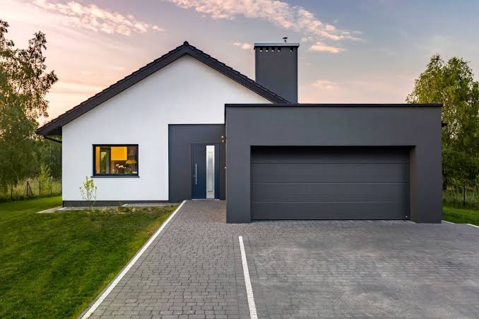 Coordinated garage and front door design enhances facade harmony