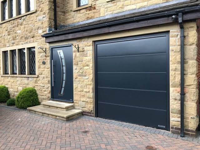 Custom aluminum garage door engineering ensures insulation, security, and reliability